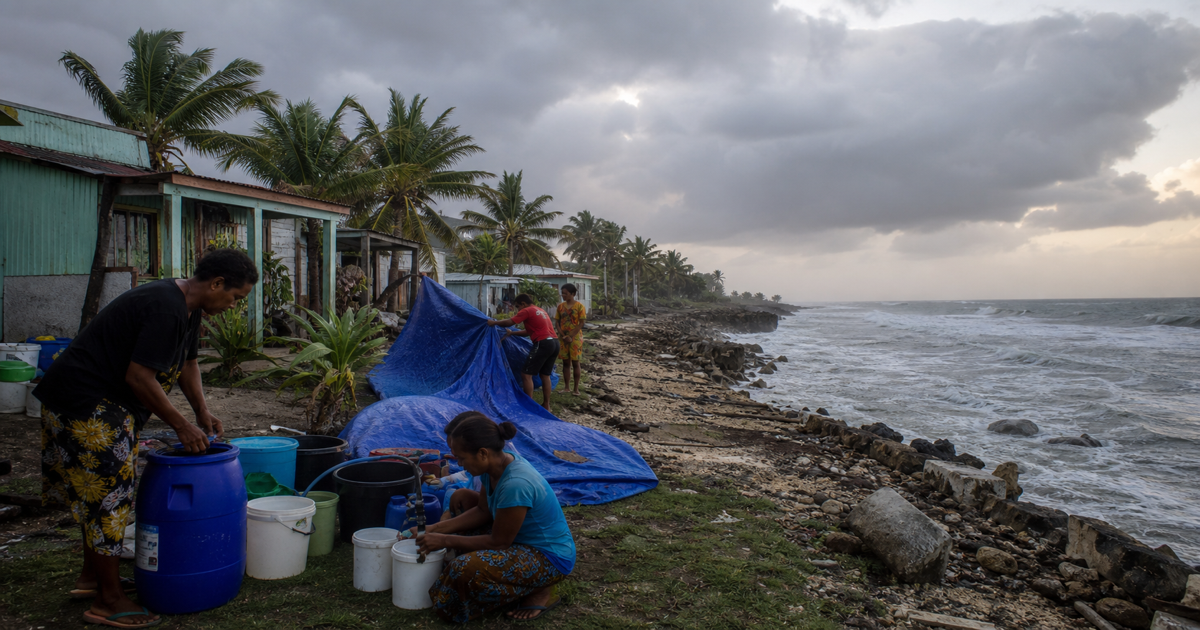 Pacific island coastline under heavy clouds before severe weather
