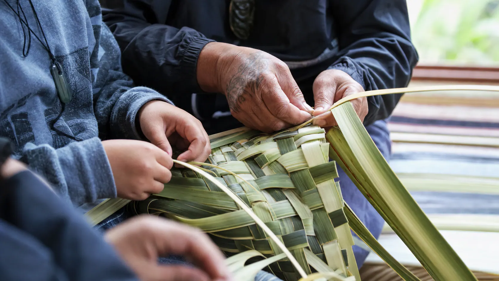He whenu, he kōrero: mā te raranga ka hono te ringa, te whenua me te whakapapa